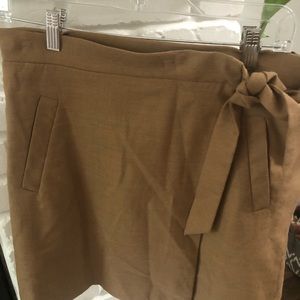 Mid thigh camel colored skirt with side tie